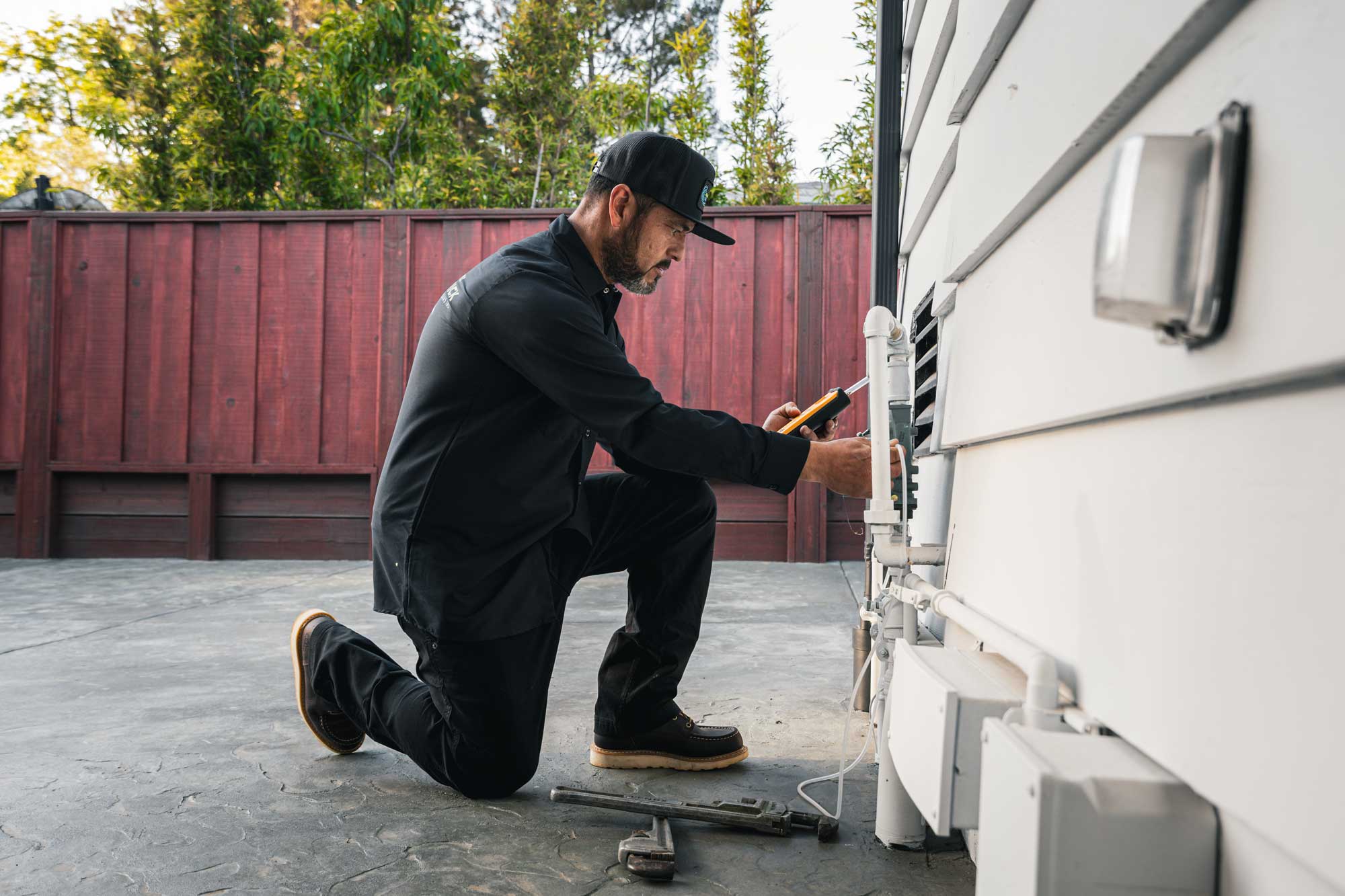 Maverick Plumbing technician servicing a residential plumbing system in Scotts Valley, California